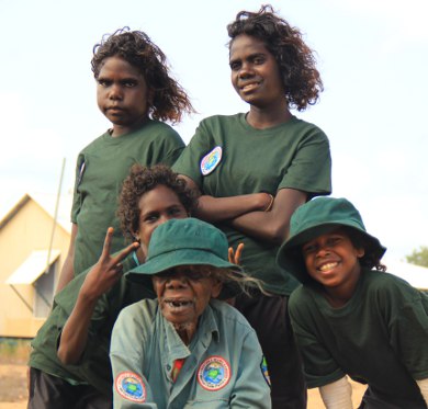 NT’s Senior Australian of the Year, Laurie Baymarrwangga, with some young Crocodile Island rangers.