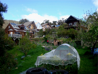 Cascade Cohousing, Hobart, was built in 1995. About a quarter of the land is preserved as open space and most of this is regenerating to the natural bush of the region. Between the regrowth and the housing are orchards, gardens and a chook run.