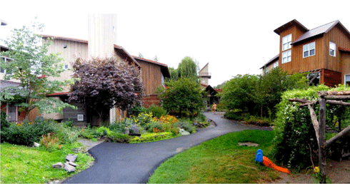 EcoVillage at Ithaca, New York State, USA. Ecovillage at Ithaca comprises three ‘neighbourhoods’. This one, known as ‘FroG’ (from “First Residents Group”), was completed in August 1997. It was the first completed cohousing project in New York State.