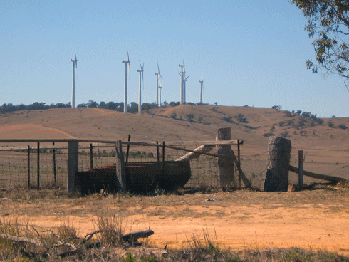 Wind turbines and surrounding farmland at the Challicum Hills Wind Farm, Victoria: Australia will need to rapidly scale up its renewable energy capacity to meet carbon targets.