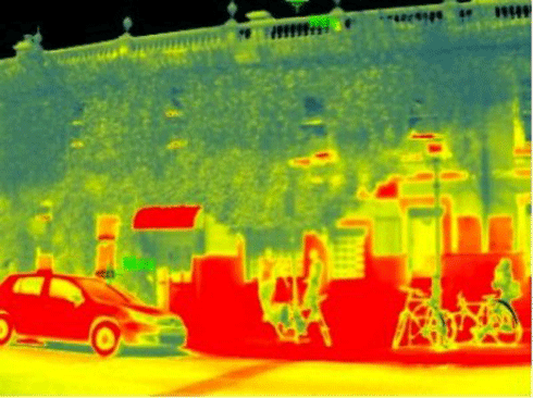 Daytime thermal image of surface temperature of a building façade on 20 March 2012. The green surface (vegetation) is cooler than the yellow and red surfaces (brick).