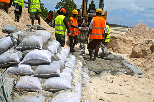 Building sea-walls, Tarawa, Kiribati: some low-lying islands are already experiencing the impact of rising sea levels.