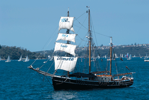 Tall ship emblazoned with ‘350’ sails Sydney Harbour as part of the 350.org International Day of Climate Action.
