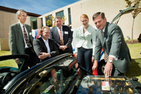 (L-R) Professor Thomas Bräunl , Terry Mader, trial participant Chris Wharton, WA Minister for Environment Donna Faragher and WA Minister for Transport Simon O’Brien, with an electric vehicle.